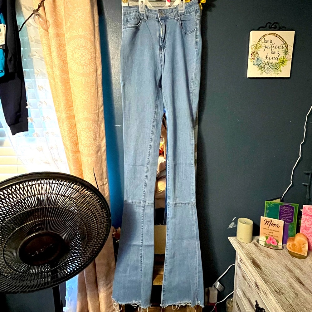 Womens extended flare blue jeans. Size M from SHEIN.